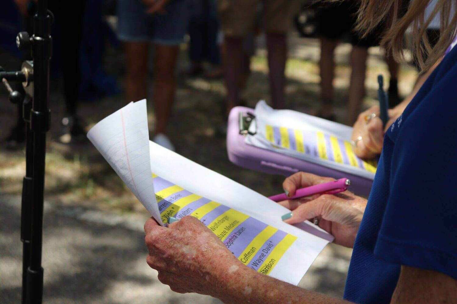 Human Hand holding a paper